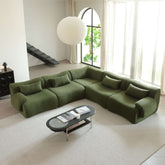 Modern sectional sofa upholstered in soft teddy velvet fabric with modular design
